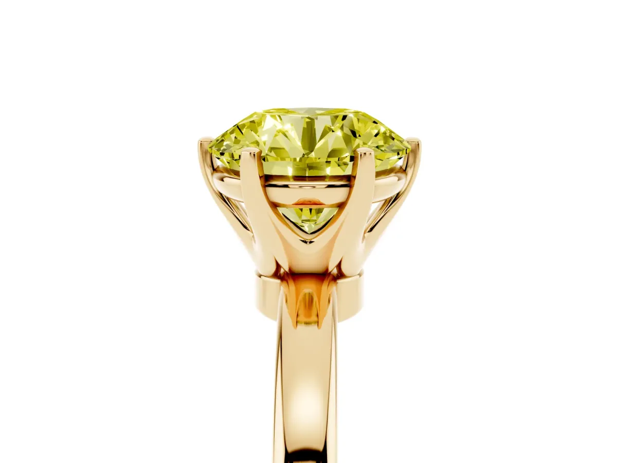 Fancy Yellow Round Cut Solitaire Diamond Ring with Six-Prong Setting on a Classic Band Yellow gold