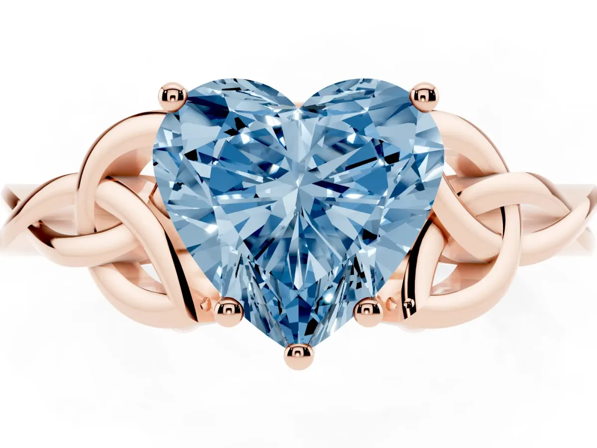 Fancy Blue Heart Cut Diamond Solitaire Engagement Ring with Celtic Knot Band and Four-Prong Setting Rose gold
