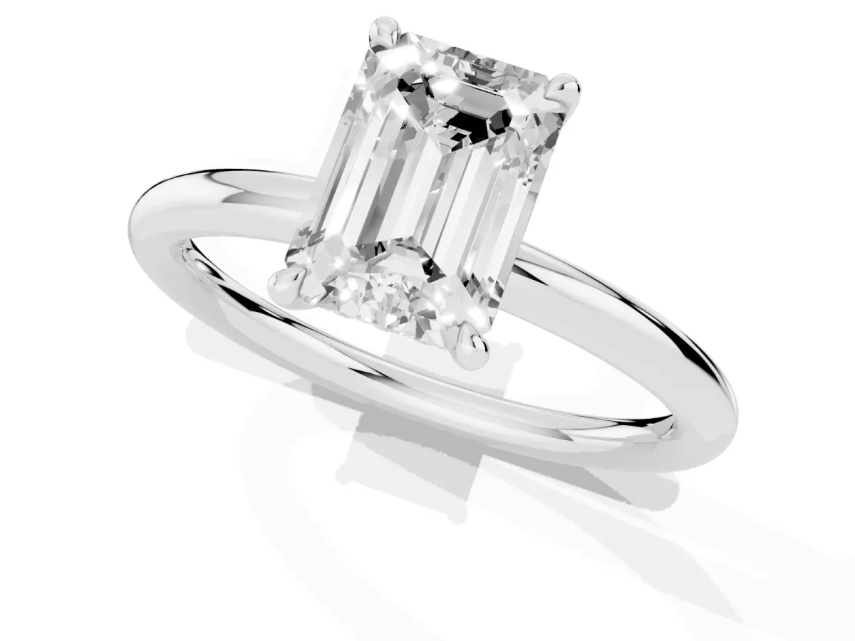 Emerald Cut Diamond Solitaire Ring with Thin Band and Four-Prong Setting White gold