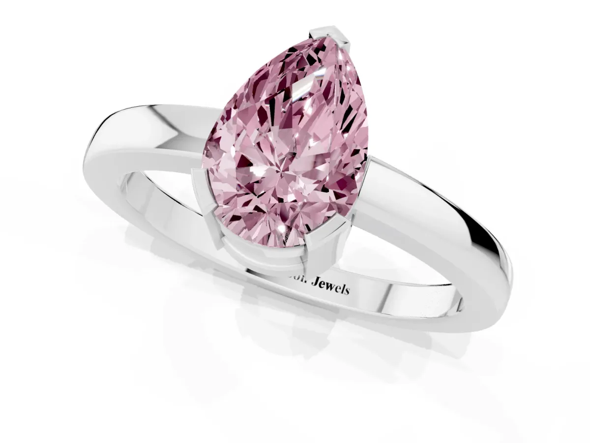 Fancy Pink Pear Cut Cut Solitaire Ring with Four-Prong Setting and Classic Band Silver