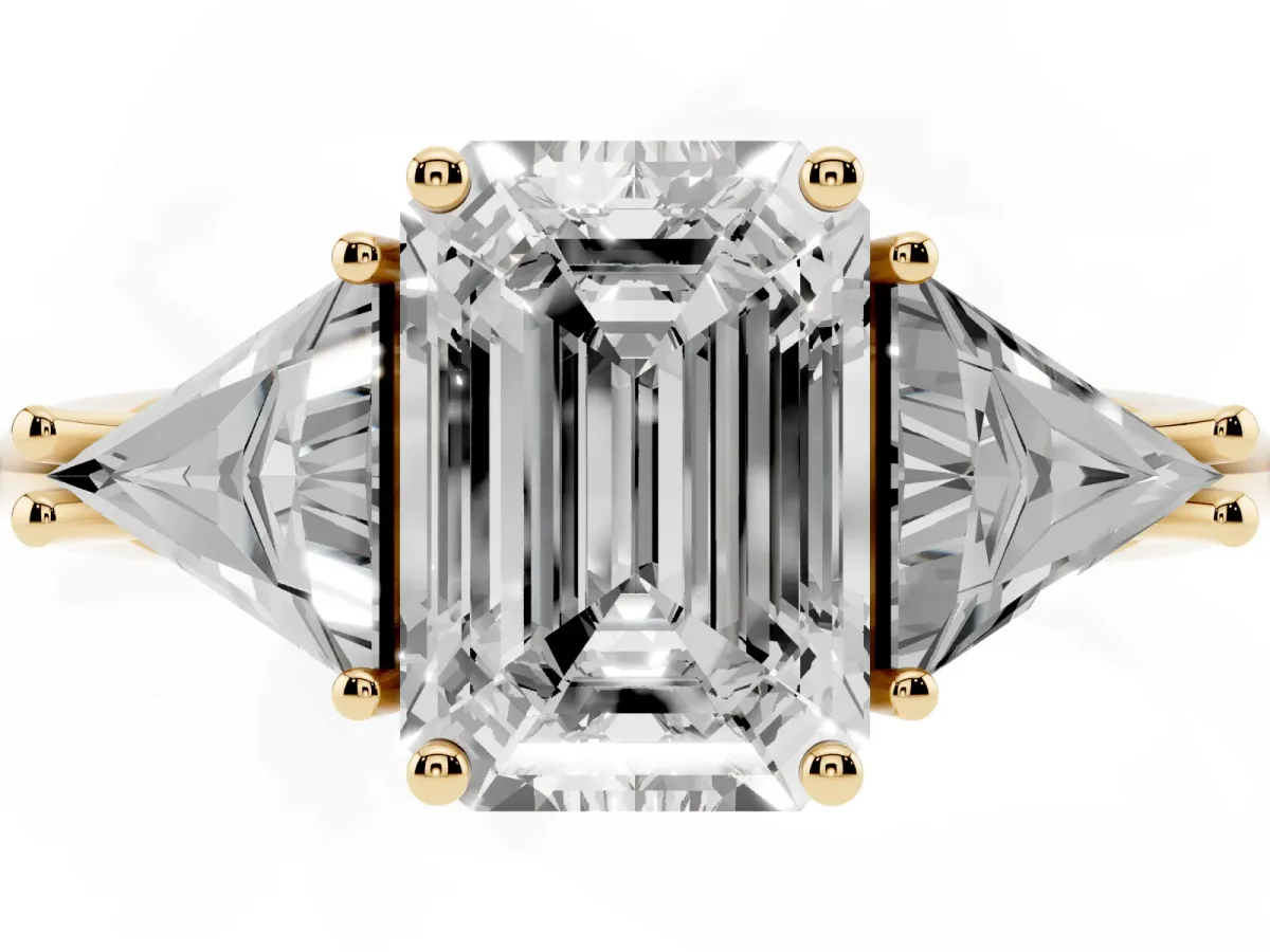 Three-Stone Emerald Cut Diamond Engagement Ring with Trillion Side Stones and Prong Setting Yellow gold