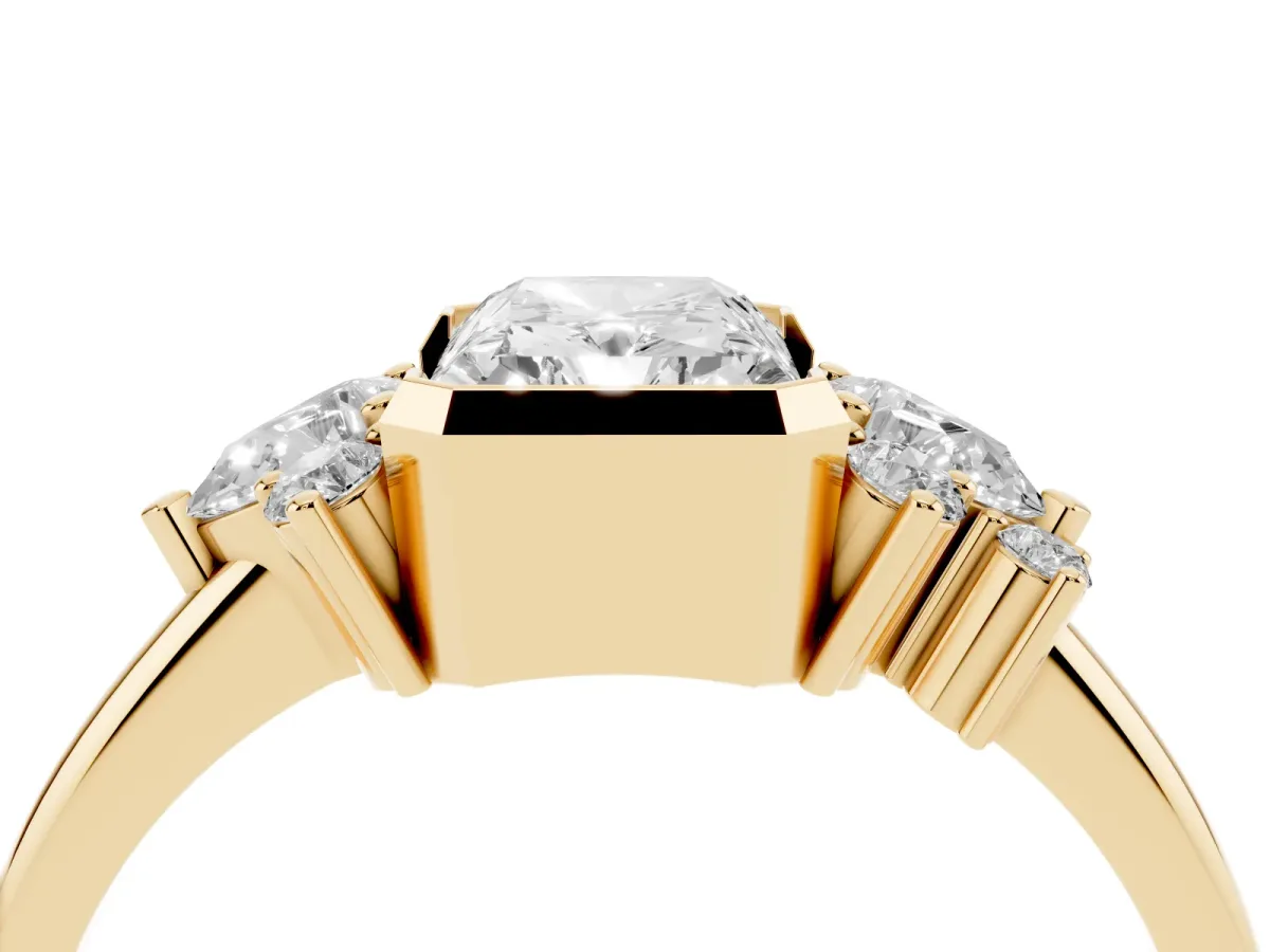 Radiant Diamond Engagement Ring with Pear and Round Side Stones Yellow gold