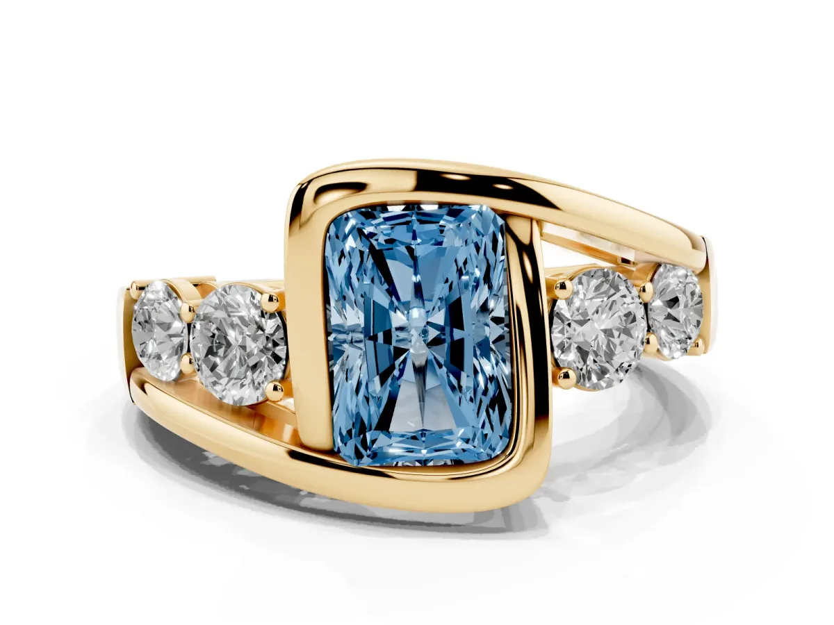 Fancy Blue Bezel Set Radiant Cut Diamond Bypass Ring with Round Accents Yellow gold