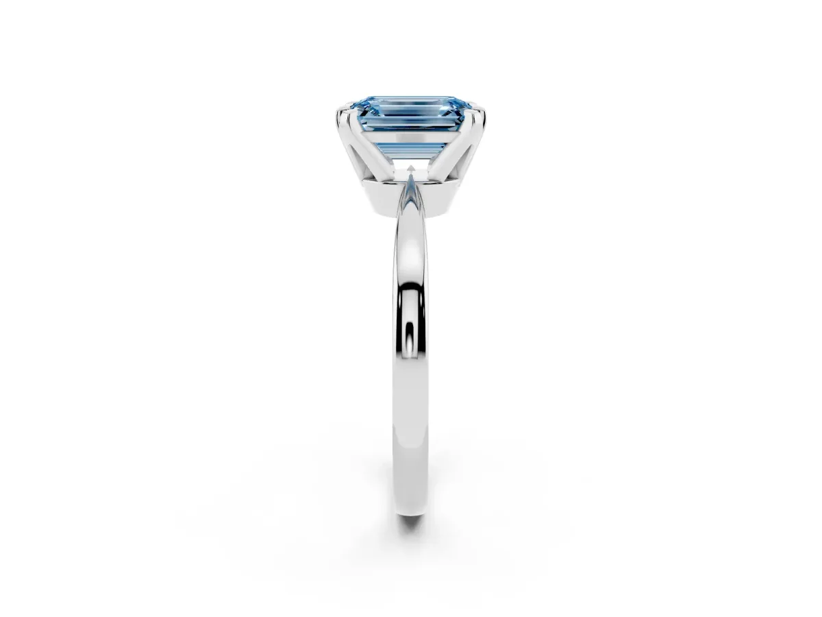 Fancy Blue Emerald Cut Solitaire Engagement Ring with Six-Prong Setting and Tapered Band Silver