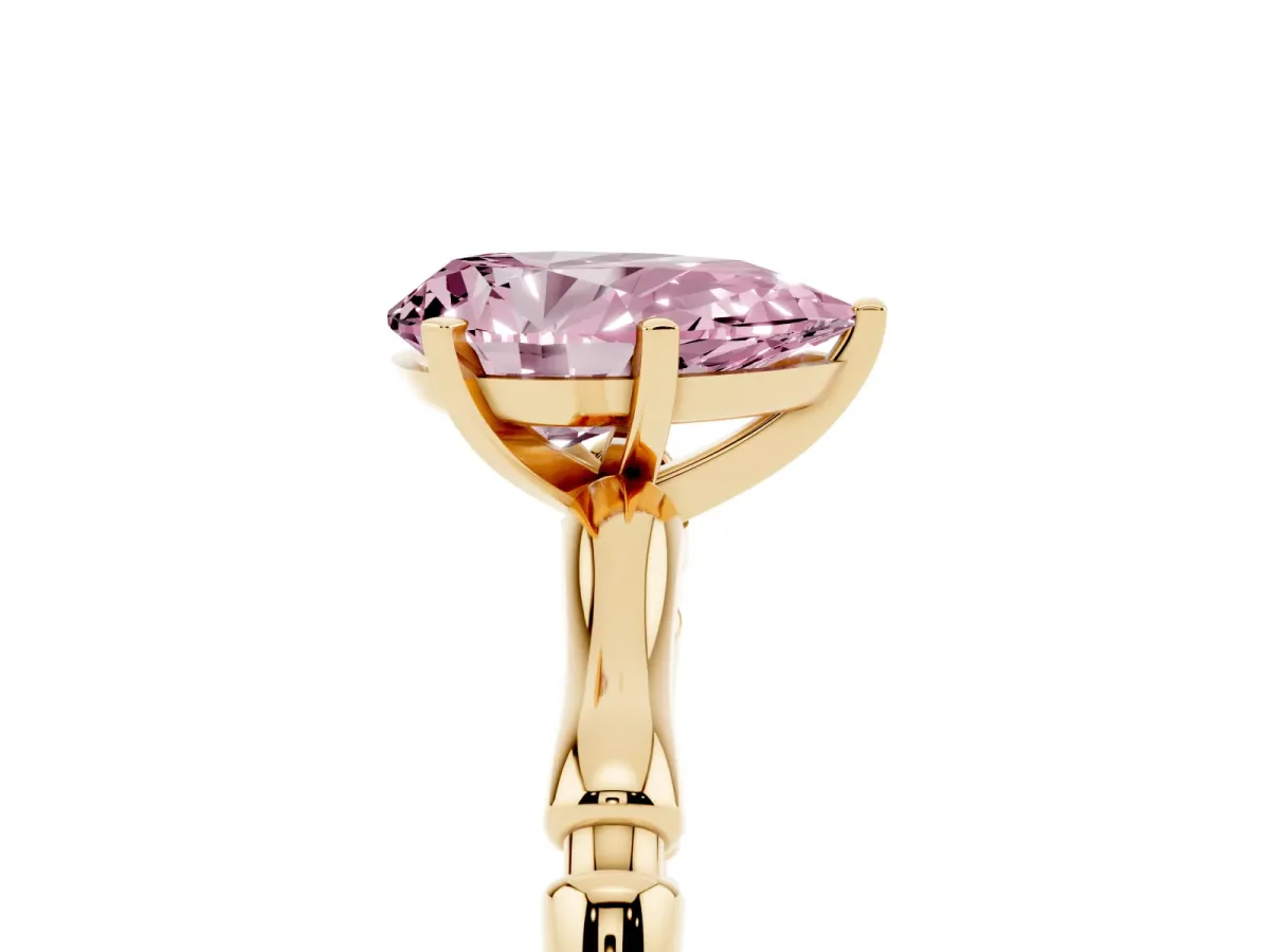 Fancy Pink Pear Cut Solitaire Diamond Ring with Bamboo Band and Four-Prong Setting Yellow gold