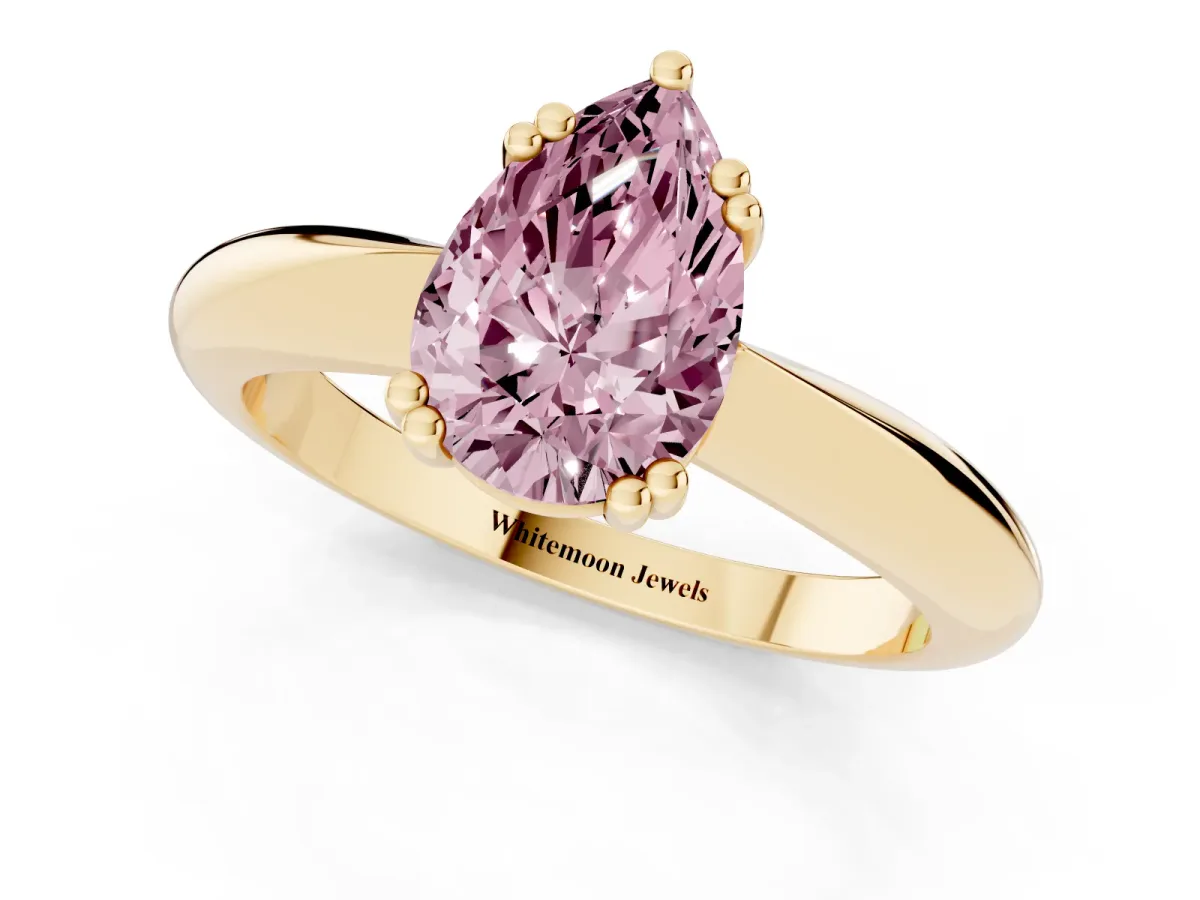 Fancy Pink Pear Cut Cut Solitaire Engagement Ring with Tapered Band and Four-Prong Setting Yellow gold