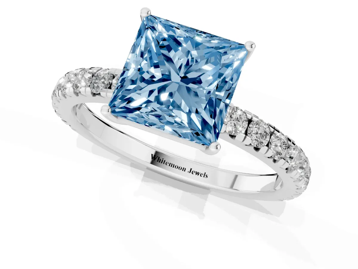 Fancy Blue Princess Cut Diamond Pavé Solitaire Engagement Ring with Four-Prong Setting Silver