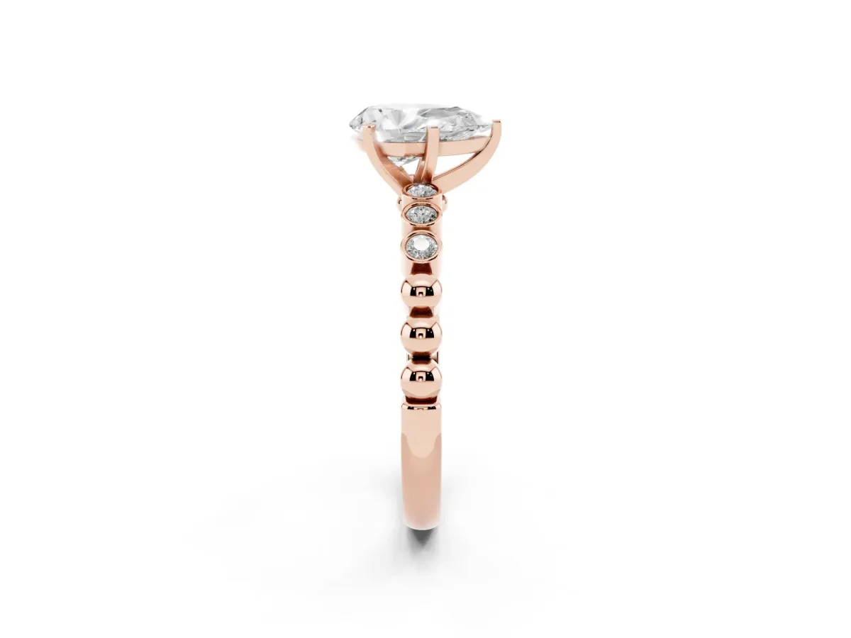 Pear Cut Solitaire Bezel Accent Diamond Engagement Ring with Beaded Band and Four-Prong Setting Rose gold