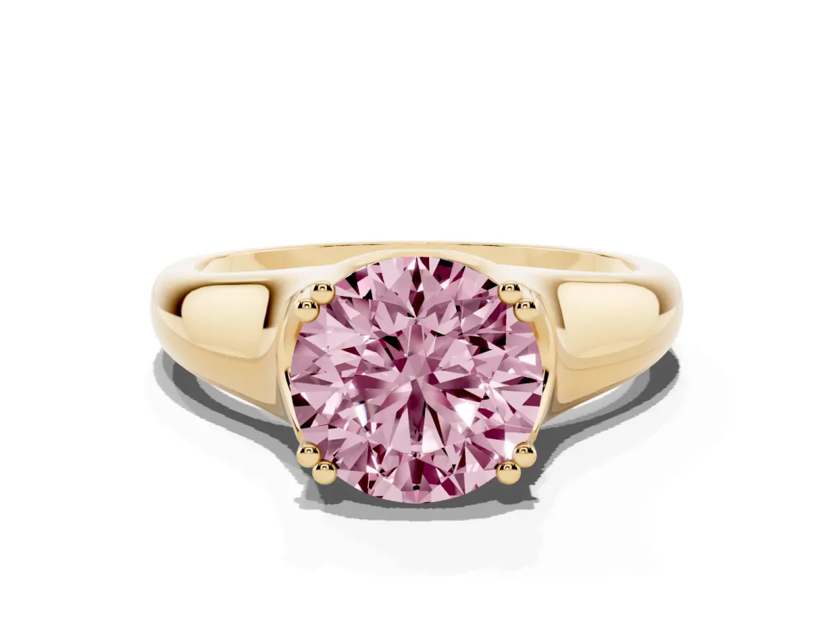 Fancy Pink Round Cut Diamond Solitaire Ring with Wide Band and Prong Setting Yellow gold