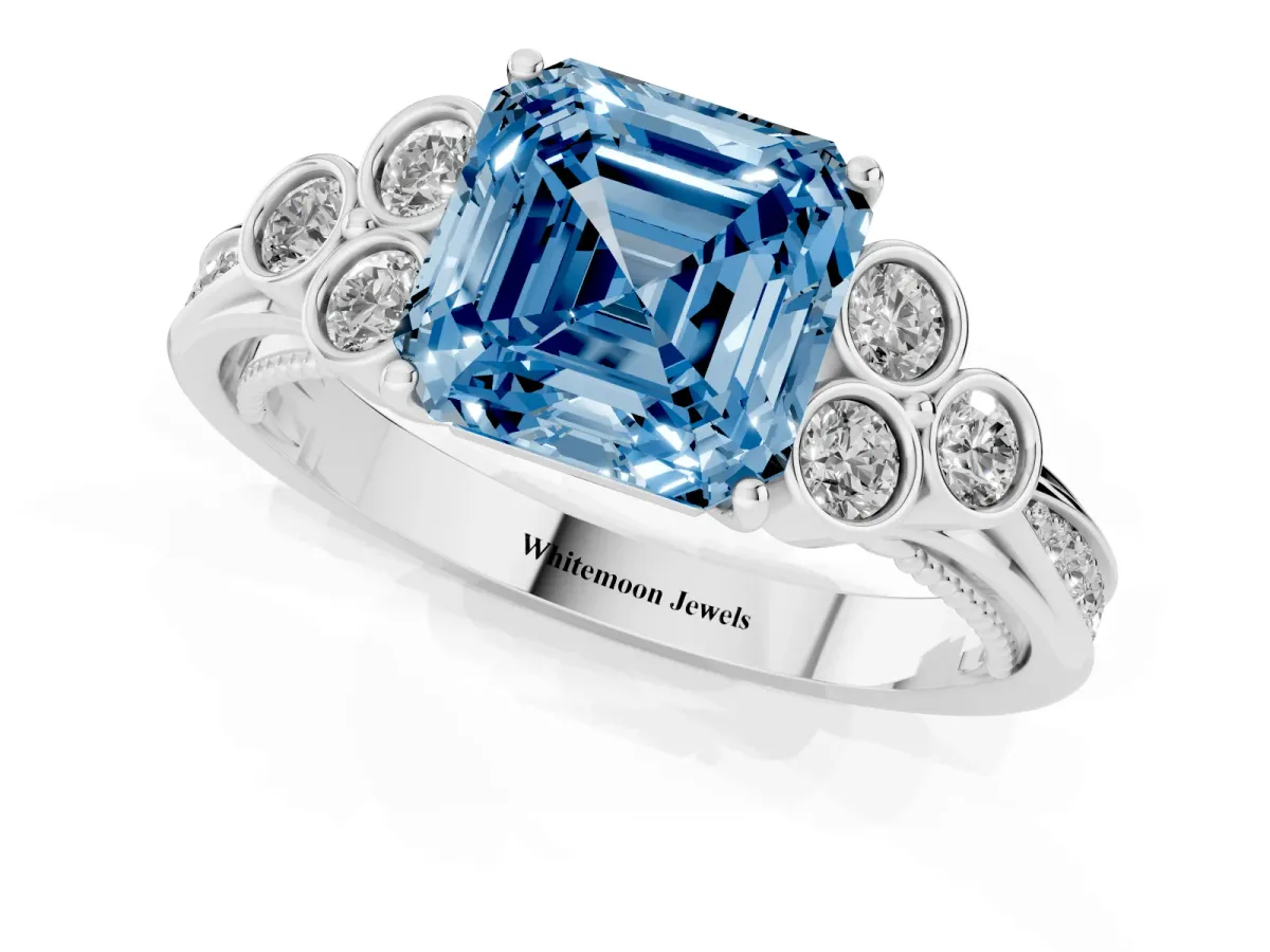 Fancy Blue Asscher Cut Cut Diamond Engagement Ring with Bezel Set Round Side Stones and Prong Setting Silver