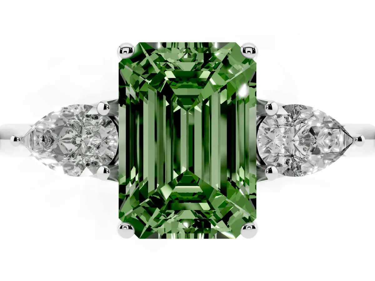 Fancy Green Three-Stone Emerald Cut Diamond Ring with Pear Side Stones in Four-Prong Setting Silver