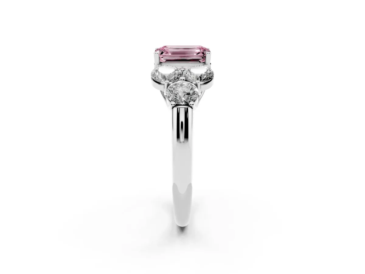 Fancy Pink Emerald Cut Cut Diamond Cluster Ring with Round Accent Stones and Prong Setting on a Classic Band Silver