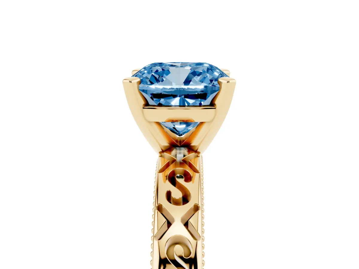 Fancy Blue Cushion Cut Solitaire Engagement Ring with Scrollwork Band and Four-Prong Setting Yellow gold