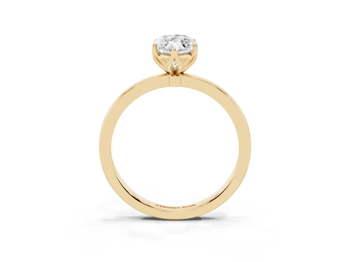 Marquise Cut Diamond Solitaire Ring with Thin Band and Prong Setting Yellow gold