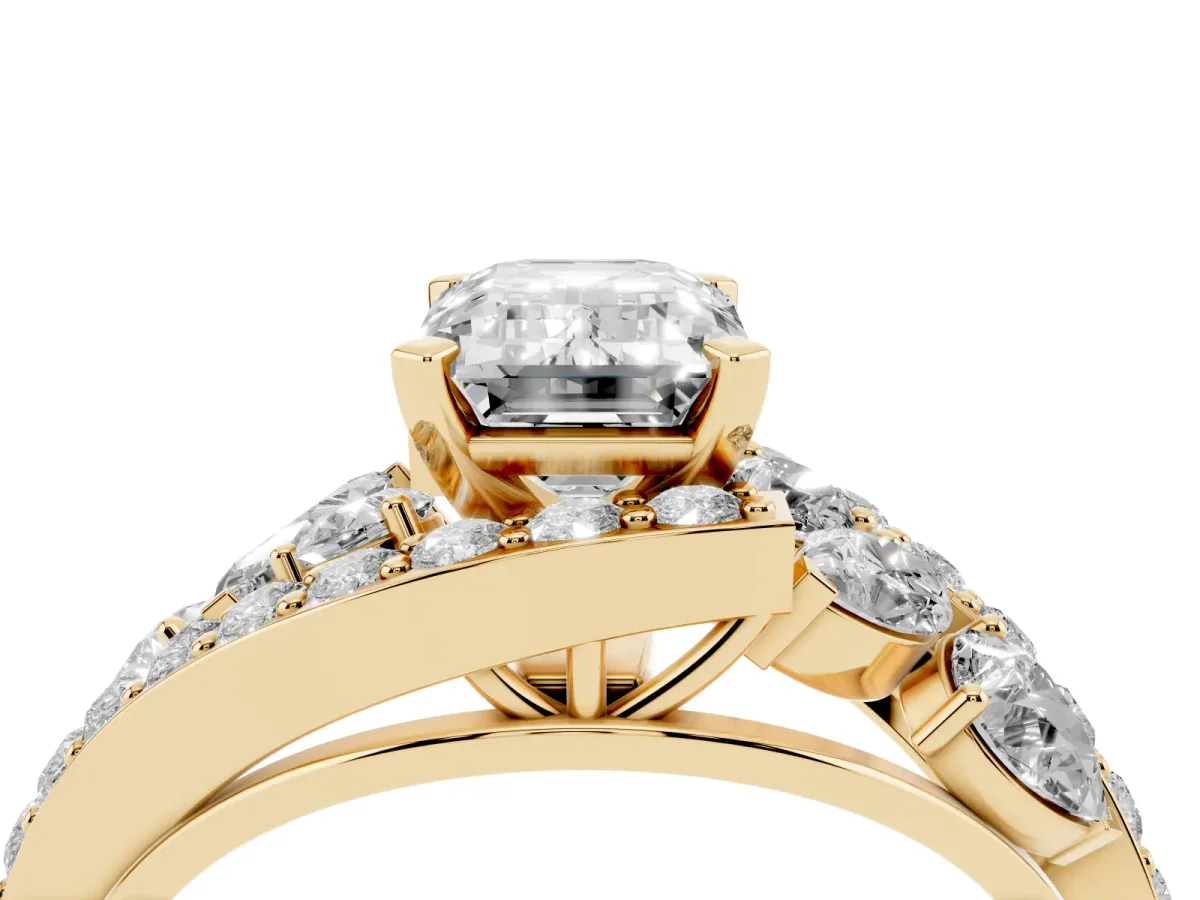Emerald Cut Diamond Halo Ring with Marquise and Pavé Band in Prong Setting Yellow gold