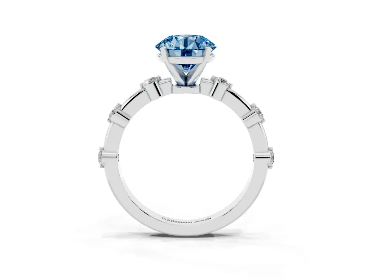 Fancy Blue Round Cut Solitaire Diamond Ring with Bezel Set Side Stones and Prong Setting Silver