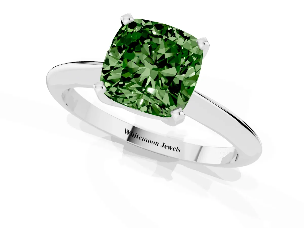 Fancy Green Cushion Cut Cut Solitaire Ring with Four-Prong Setting on a Classic Band Silver