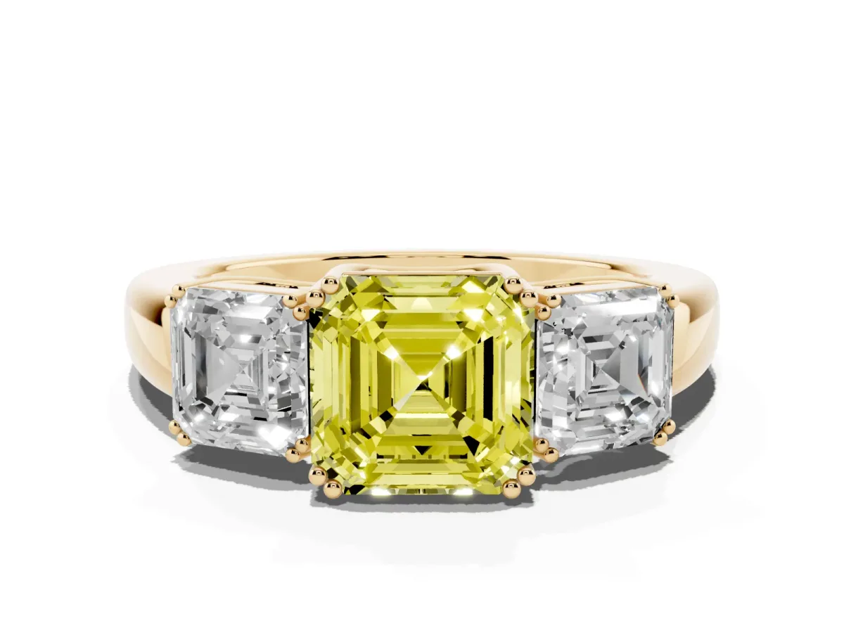 Fancy Yellow Three-Stone Asscher Cut Cut Diamond Ring with Channel Set Band and Four-Prong Setting Yellow gold