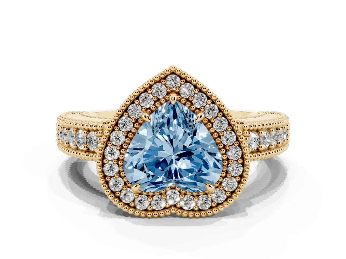 Fancy Blue Heart Cut Cut Halo Diamond Ring with Pavé Band and Four-Prong Setting Yellow gold