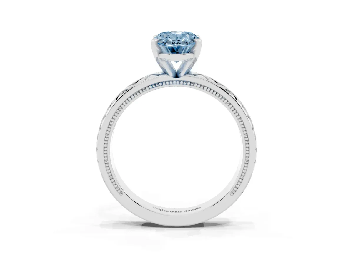 Fancy Blue Oval Cut Solitaire Diamond Ring with Milgrain and Black Enamel X Pattern Band Platinum