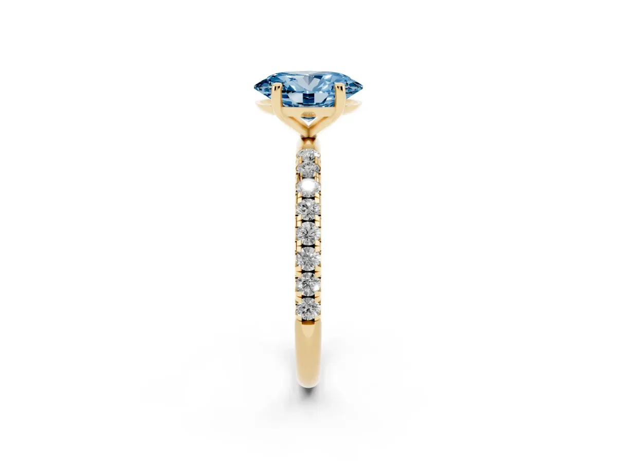 Fancy Blue Oval Cut Cut Diamond Solitaire Ring with Micro Pave Band and Four Prong Setting Yellow gold