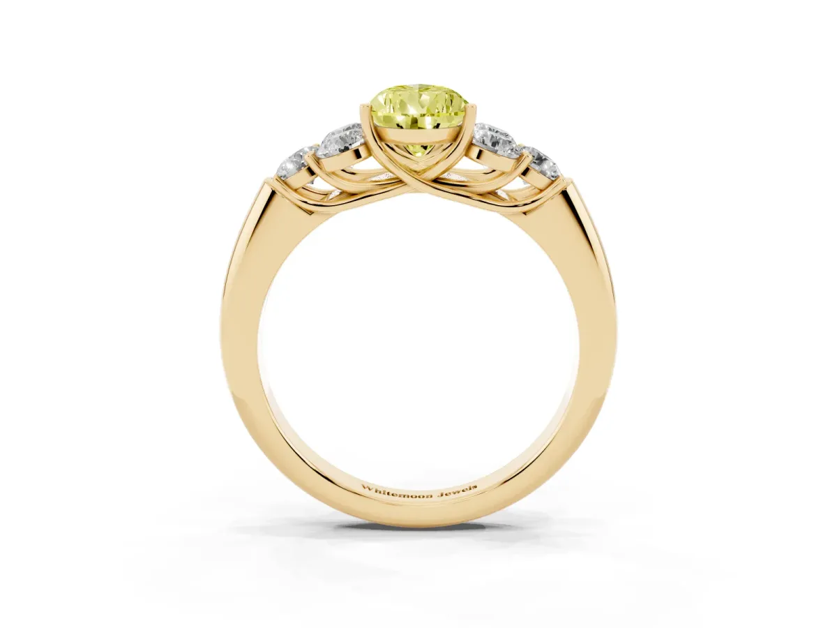 Fancy Yellow Pear Cut Cut Diamond Cluster Ring with Round Accent Stones and Prong Setting on a Classic Band Yellow gold