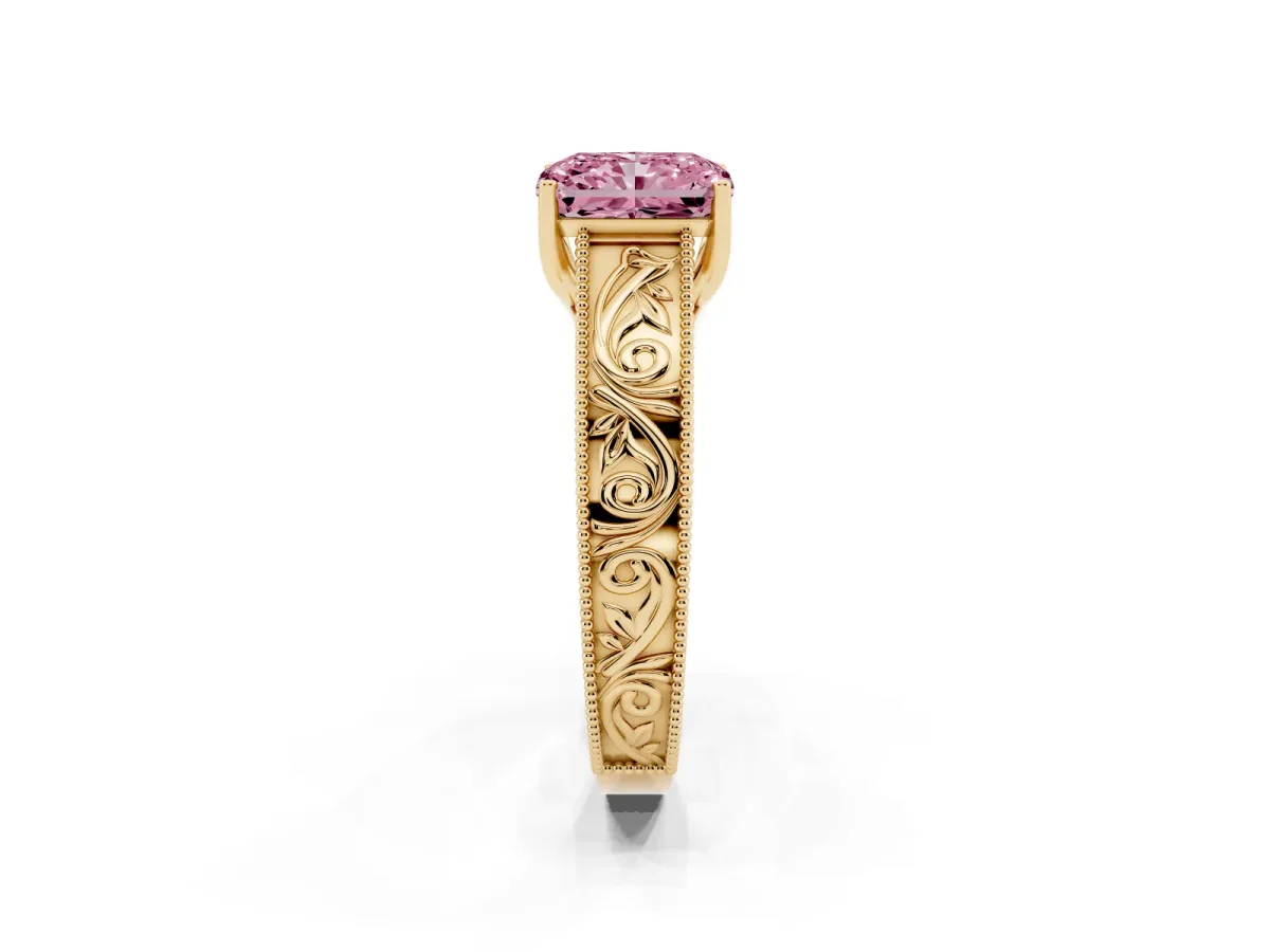 Fancy Pink Radiant Cut Diamond Solitaire Ring with Engraved Band and Four-Prong Setting Yellow gold