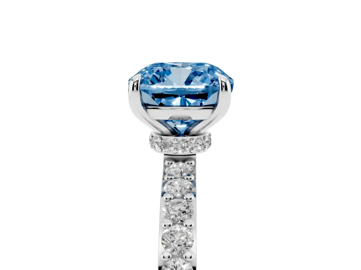 Fancy Blue Cushion Cut Diamond Solitaire Engagement Ring with Pavé Band and Four-Prong Setting Silver