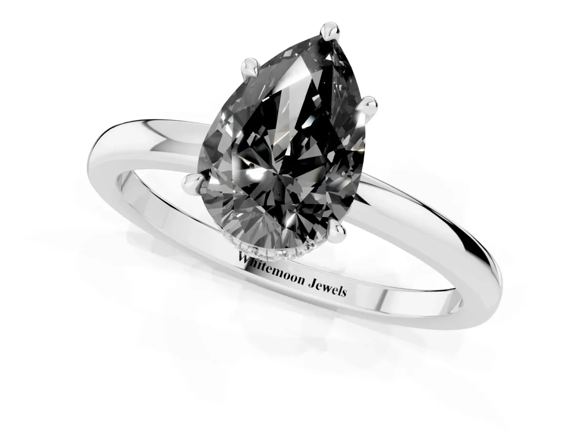 Fancy Black Pear Cut Solitaire Engagement Ring with Cathedral Band and Four-Prong Setting Silver