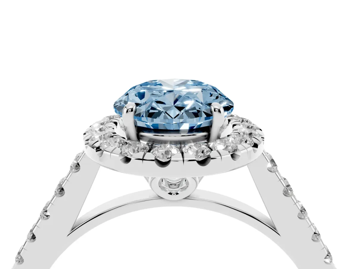 Fancy Blue Oval Cut Halo Pavé Diamond Engagement Ring with Four-Prong Setting Silver