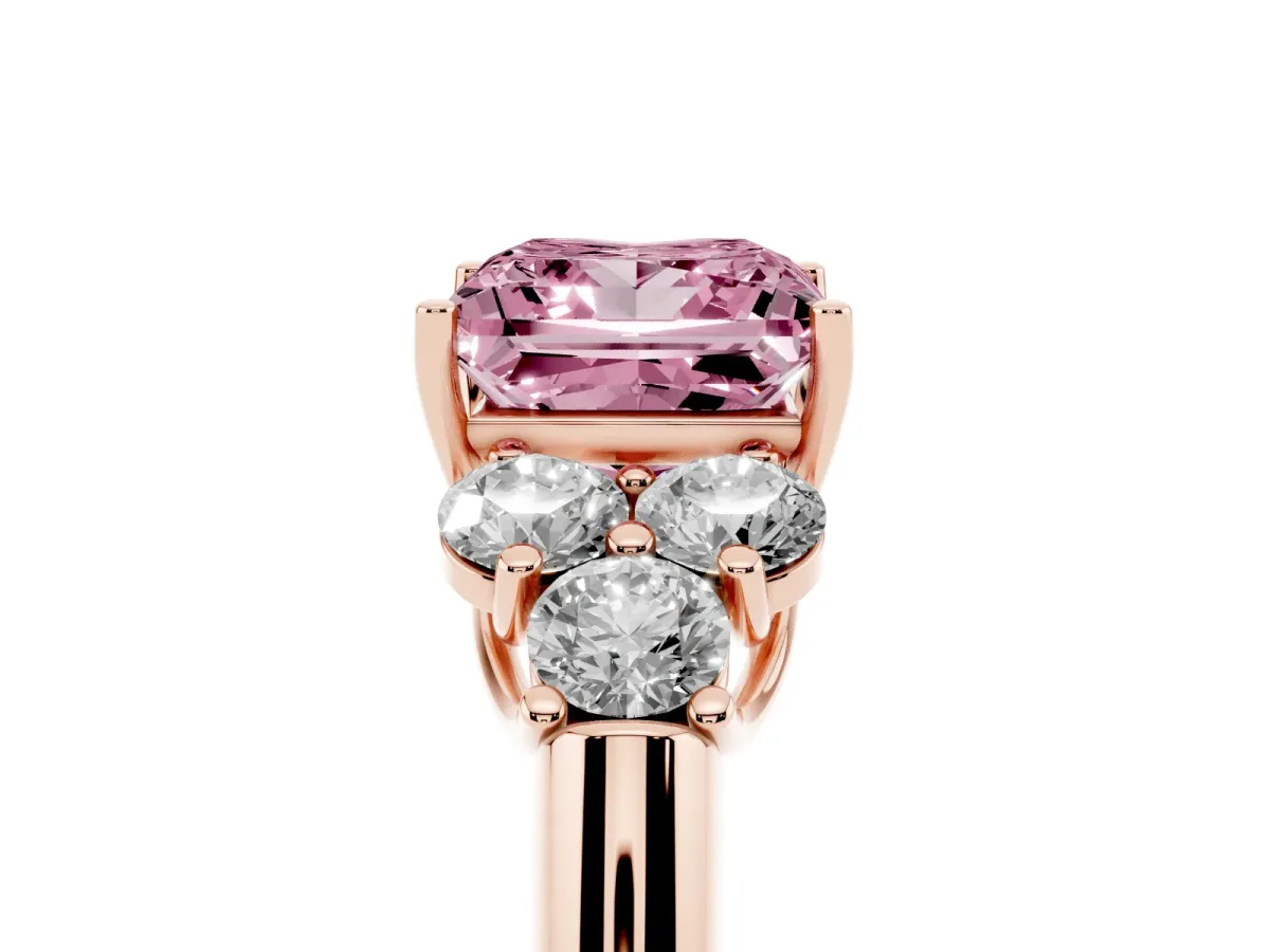 Fancy Pink Princess Cut Cut Diamond Cluster Ring with Round Accent Stones and Prong Setting on a Classic Band Rose gold
