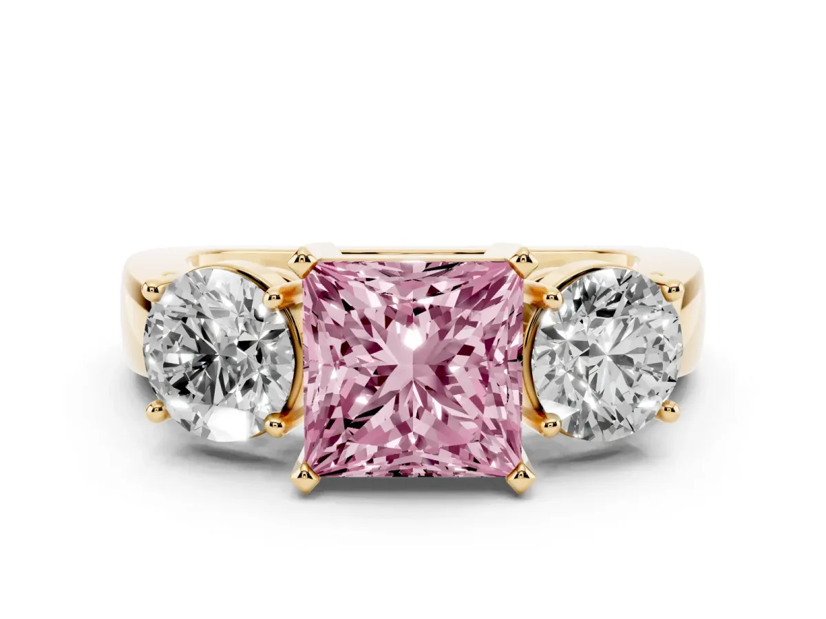 Fancy Pink Three-Stone Princess Cut Diamond Ring with Round Side Stones, Classic Band, and Four-Prong Setting Yellow gold