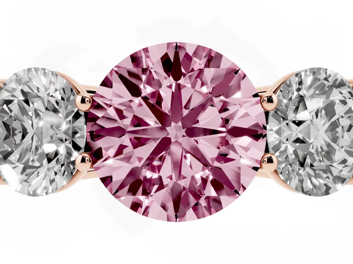 Fancy Pink Round Cut Three-Stone Diamond Ring with Prong Setting on a Classic Band Rose gold