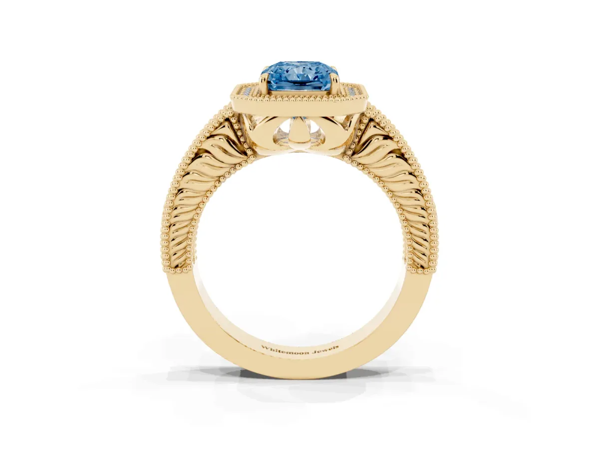 Fancy Blue Radiant Cut Cut Halo Diamond Ring with Pavé Band and Four-Prong Setting Yellow gold
