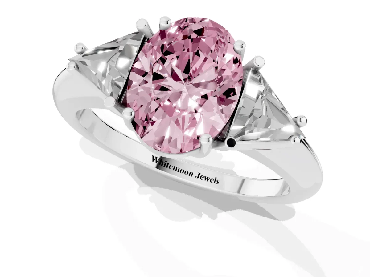 Fancy Pink Three-Stone Oval Cut Diamond Engagement Ring with Trillion Side Stones and Prong Setting Silver