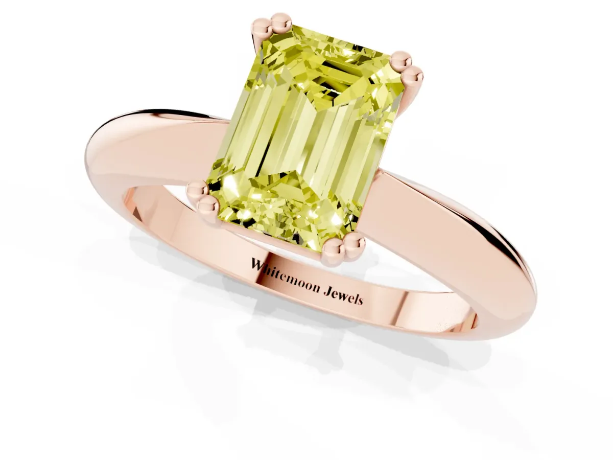 Fancy Yellow Emerald Cut Cut Solitaire Engagement Ring with Tapered Band and Four-Prong Setting Rose gold