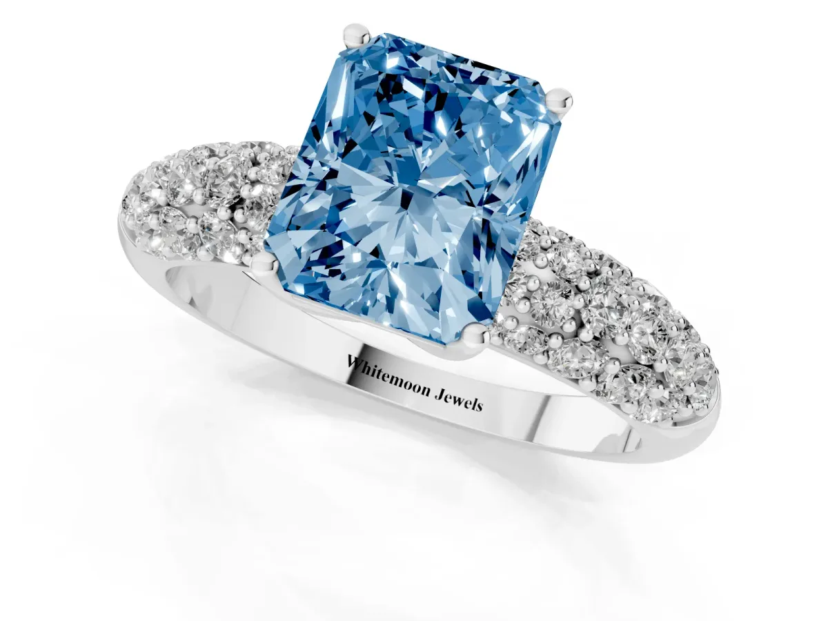 Fancy Blue Radiant Cut Diamond Pavé Band Solitaire Ring with Four-Prong Setting Platinum