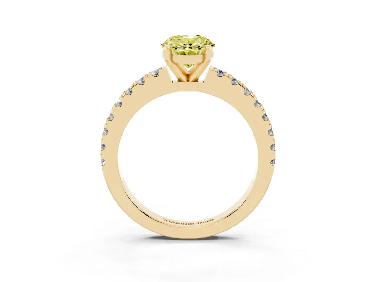 Fancy Yellow Oval Cut Solitaire Diamond with Pavé Band and Four-Prong Setting Yellow gold