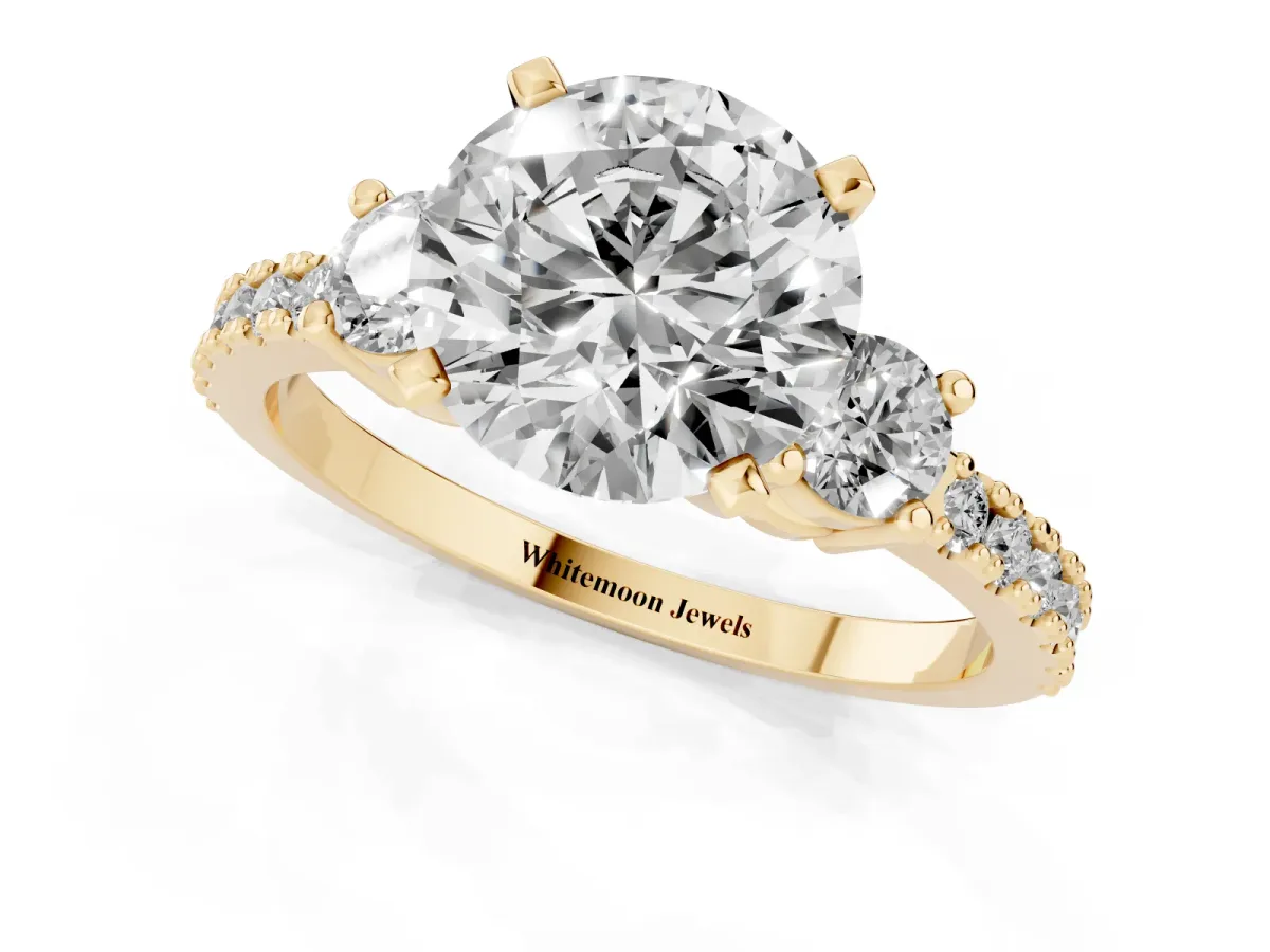 Round Cut Three-Stone Diamond Pavé Band with Prong Setting Yellow gold