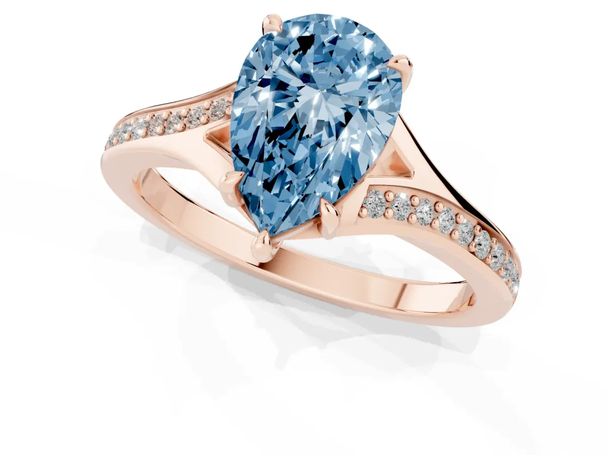 Fancy Blue Pear Cut Diamond Solitaire Ring with Pavé Band and Prong Setting Rose gold