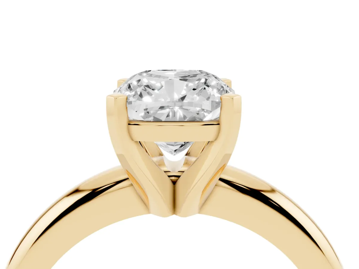 Cushion Cut Diamond Solitaire Engagement Ring with Round Band and Four-Prong Setting Yellow gold