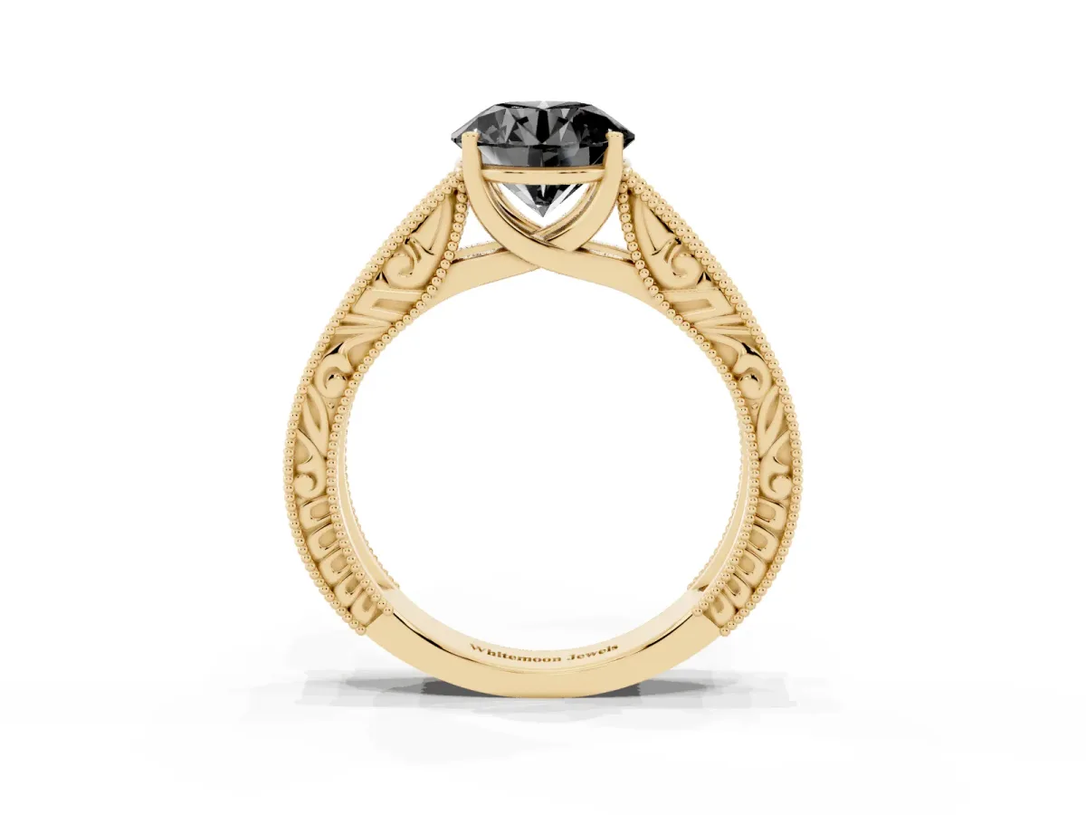 Fancy Black Round Cut Diamond Solitaire Ring with Engraved Band and Four-Prong Setting Yellow gold