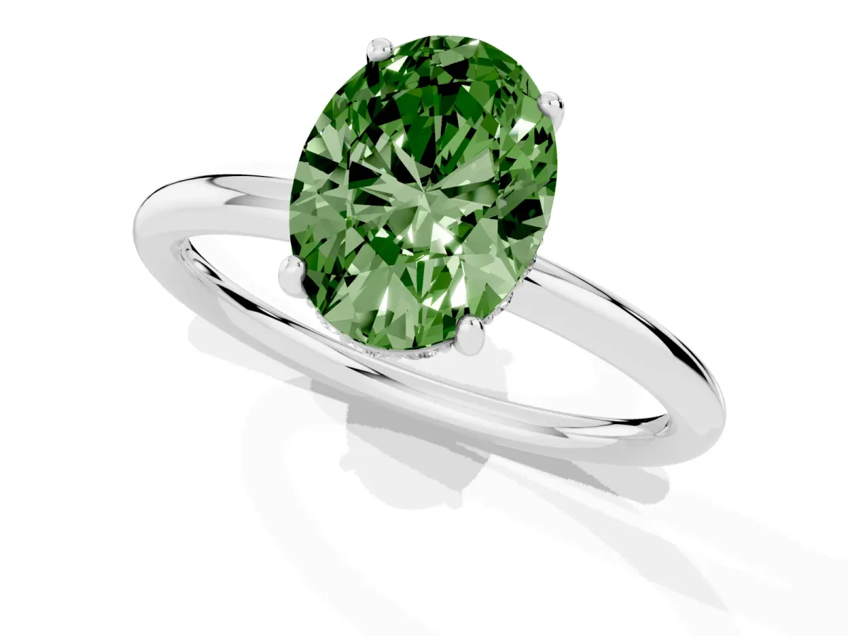 Fancy Green Oval Cut Solitaire Diamond Ring with a Classic Band and Four-Prong Setting Silver