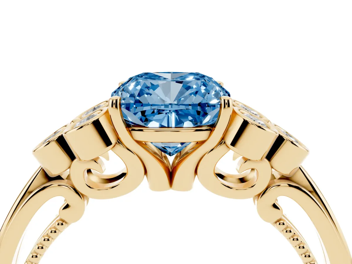 Fancy Blue Cushion Cut Cut Diamond Engagement Ring with Bezel Set Round Side Stones and Prong Setting Yellow gold