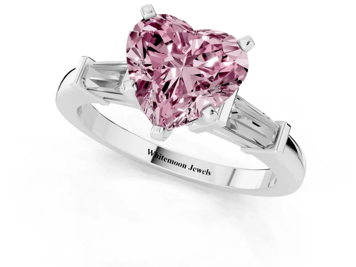 Fancy Pink Heart Cut Cut Diamond Solitaire Ring with Tapered Baguette Accents and Four-Prong Setting White gold