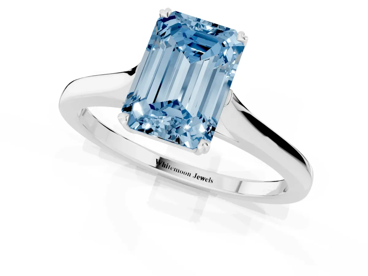 Fancy Blue Emerald Cut Solitaire Heart Prong Engagement Ring with Tapered Band Silver