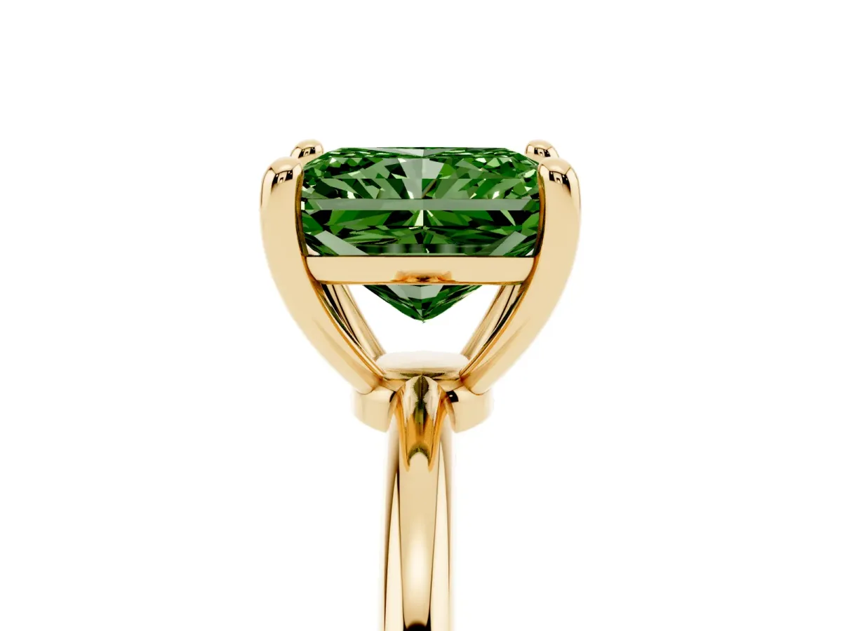 Fancy Green Radiant Cut Solitaire Diamond Ring with 4-Prong Setting on a Classic Band Yellow gold