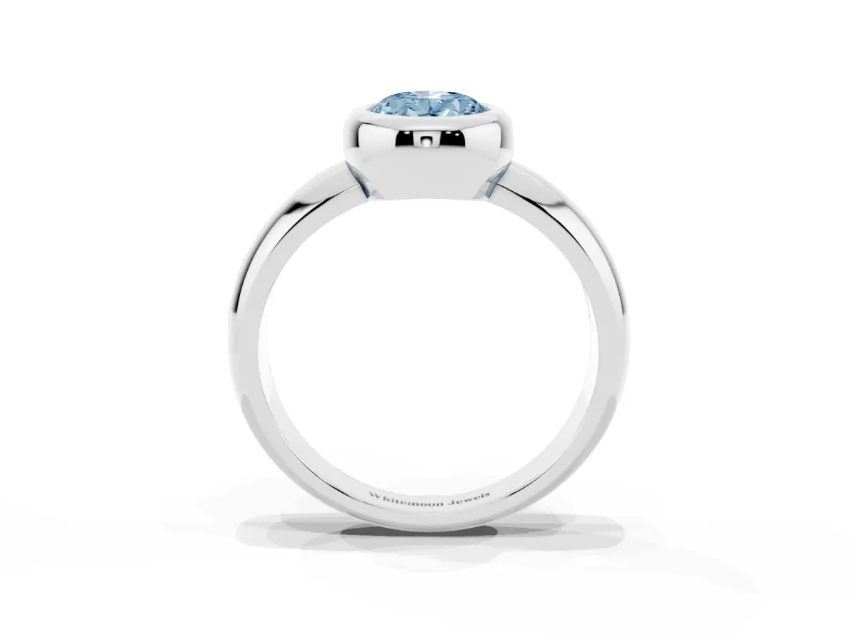 Fancy Blue Bezel Set Oval Cut Solitaire Ring with Wide Band Platinum
