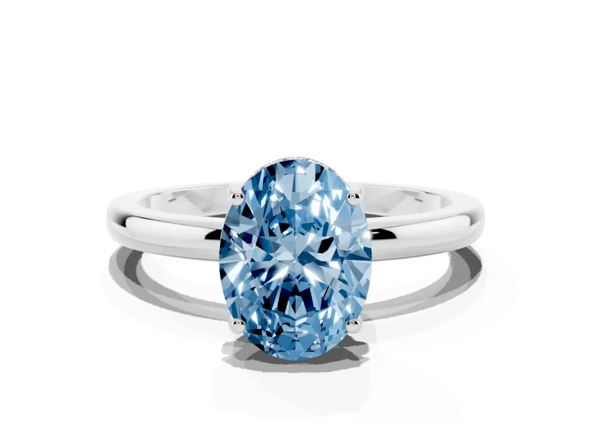 Fancy Blue Oval Cut Solitaire Diamond Ring with Prong Setting and Plain Band Platinum