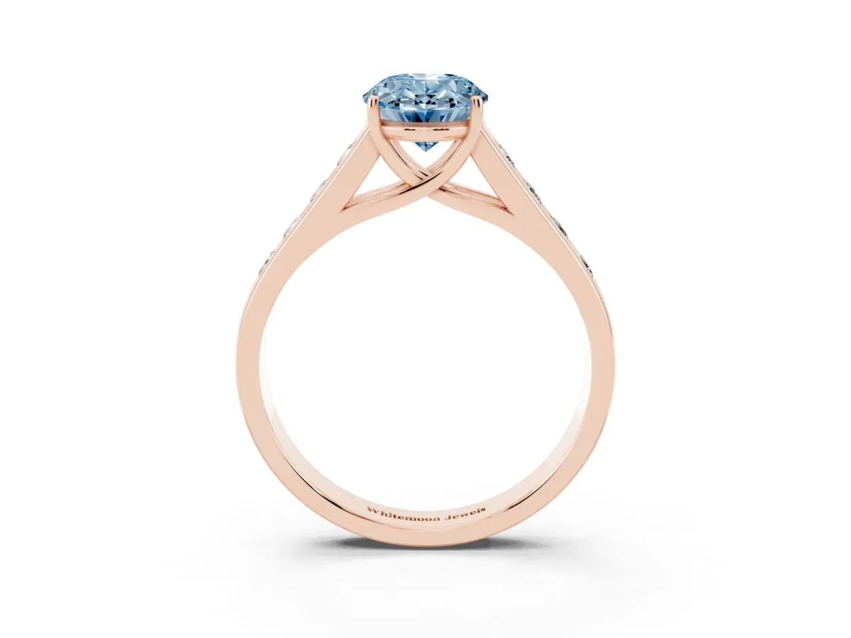 Fancy Blue Oval Cut Brilliant Channel-Set Solitaire Ring with Four-Prong Setting Rose gold